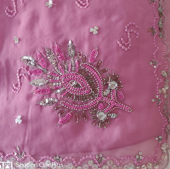 Pink georgette saree with silver sequins